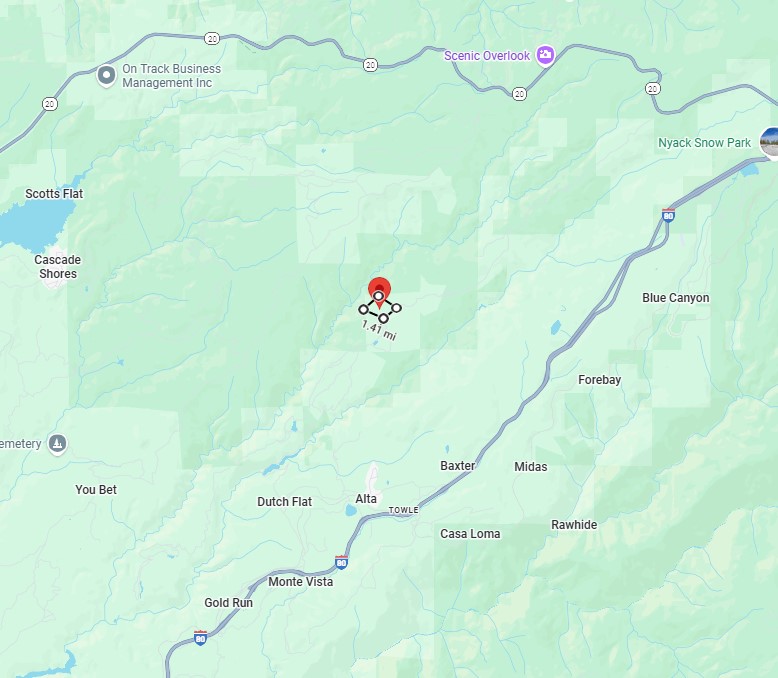 Aerial view of the forested 62-acre property