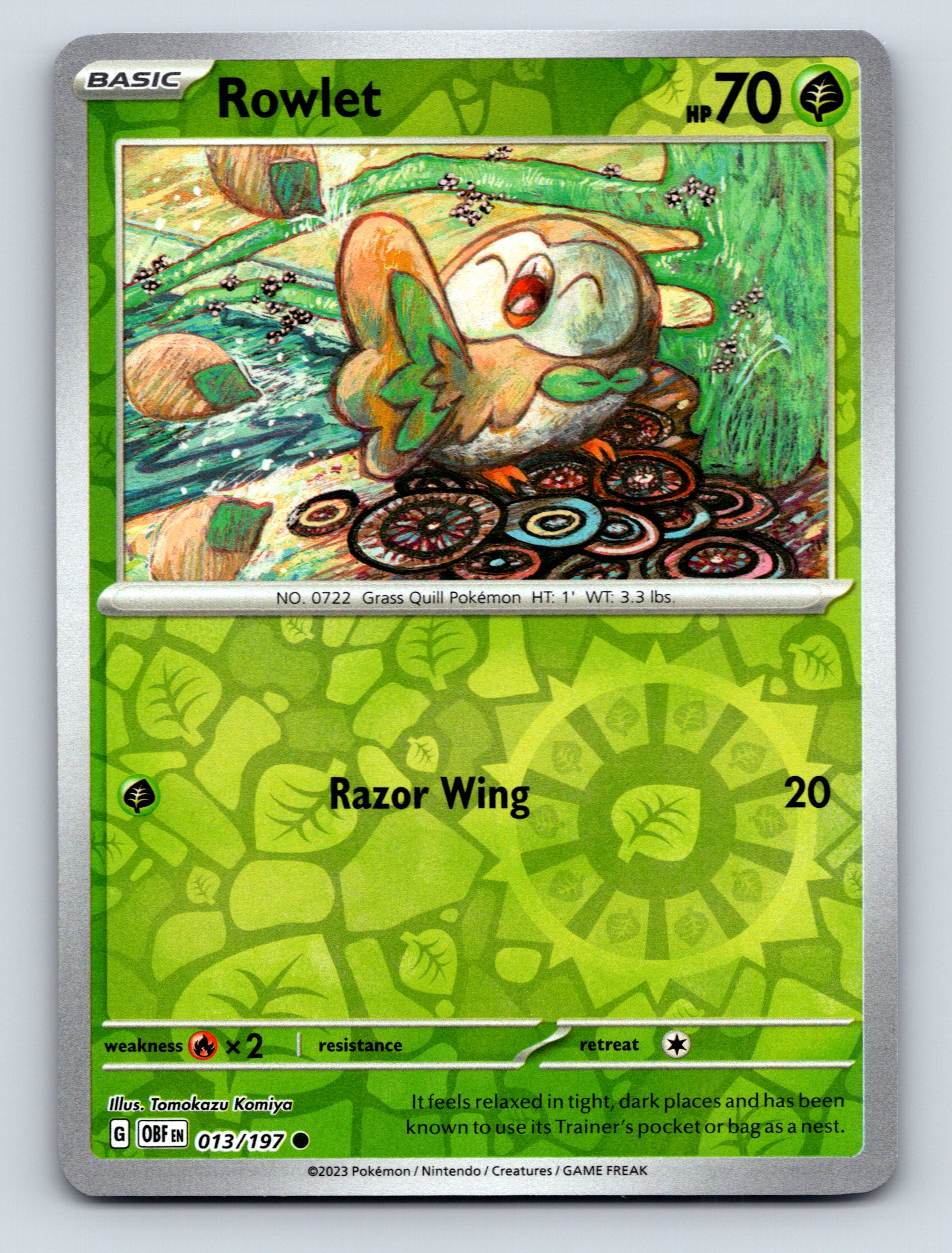Basic Rowlet HP 70 Razor Wing Attack Grass Pokémon Card Green Background